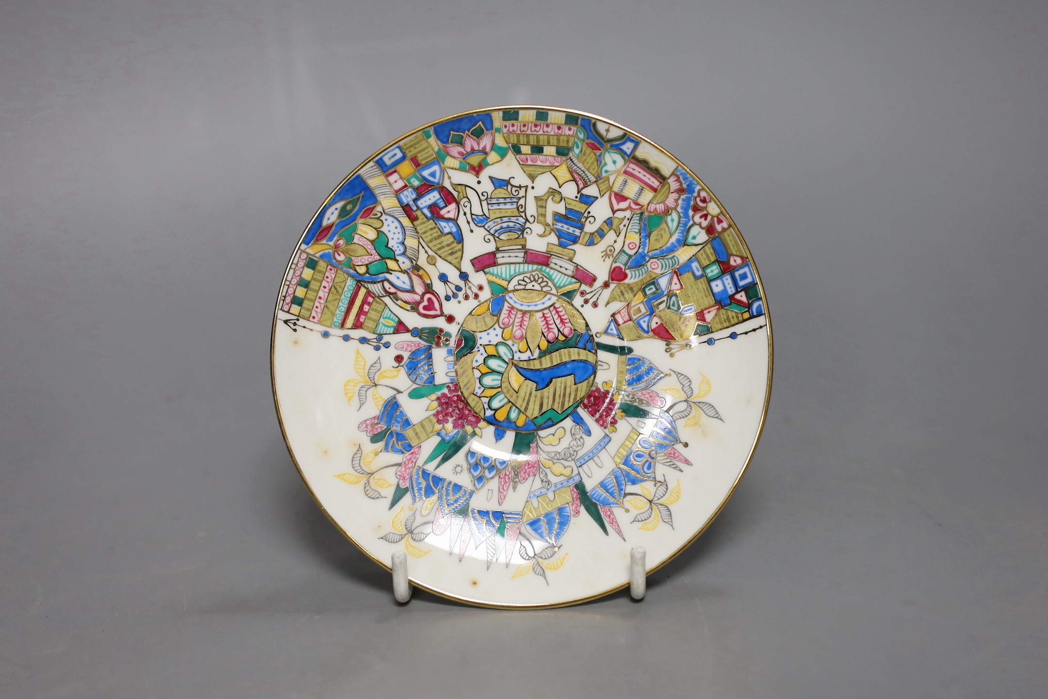 A Russian gilt enamel porcelain tea cup and saucer, cup 8cms high